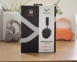 Pudełko słuchawek beyerdynamic Aventho 300 z logo Dolby Atmos, sugerujące immersyjne wrażenia dźwiękowe.