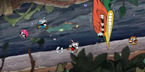 Cuphead i Mugman uciekają przed gigantyczną marchewką w jednej z najlepszych gier indie.