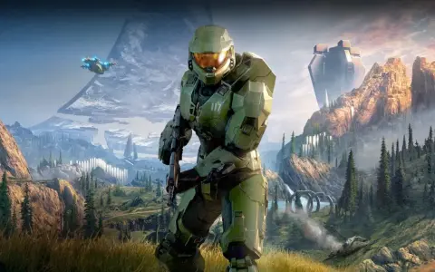 Master Chief w zbroi z Halo Infinite stoi na tle górskiego krajobrazu z pierścieniem Halo i pojazdem UNSC.