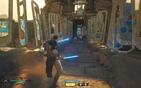Jedi Survivor: Cal Kestis z niebieskim mieczem świetlnym w starożytnych ruinach, walczy z droidami.