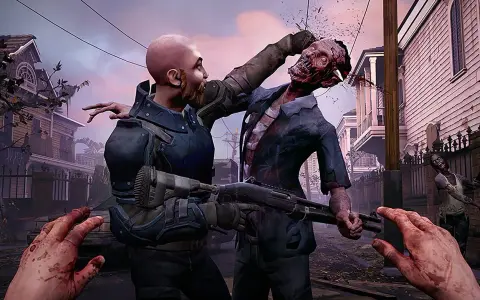 Intensywna scena z gry o zombie: mężczyzna walczy z potworem, strzelając mu w głowę. W tle widać inne zombie i zniszczone domy.