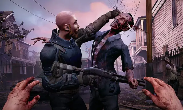 Intensywna scena z gry o zombie: mężczyzna walczy z potworem, strzelając mu w głowę. W tle widać inne zombie i zniszczone domy.